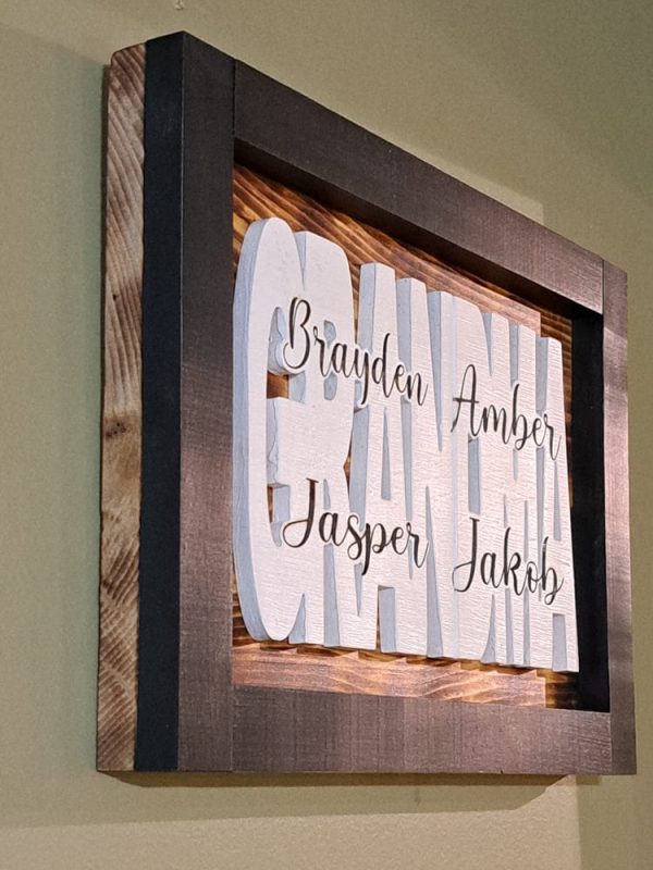 Custom wood family children/grandchildren engraved sign with black border and white parent/grandparent backing. Made in Canada by Bergeron Woodgrains