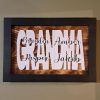 Custom wood family children/grandchildren engraved sign with black border and white parent/grandparent backing. Made in Canada by Bergeron Woodgrains