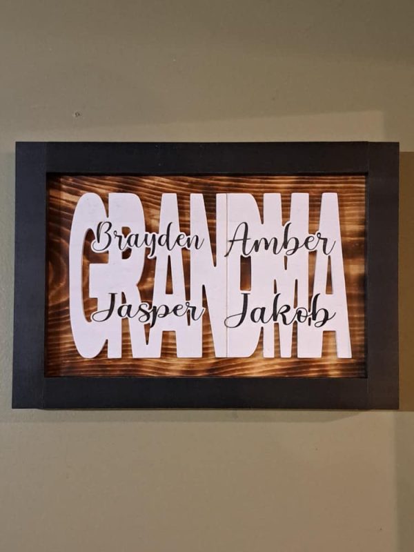 Custom wood family children/grandchildren engraved sign with black border and white parent/grandparent backing. Made in Canada by Bergeron Woodgrains