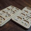 Handcrafted Mancala board game using Canadian Maple, authentic stone pieces and embedded magnetic closures. Convenient design and compact storage, made by Bergeron Woodgrains.