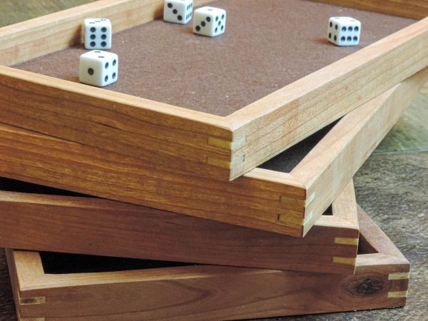 Wood dice tray with maple miter keys and felt inlay on a baltic birch bottom. Perfect for yahtzee, sorry, Parcheesi, Monopoly and Clue. Made in Canada by Bergeron Woodgrains