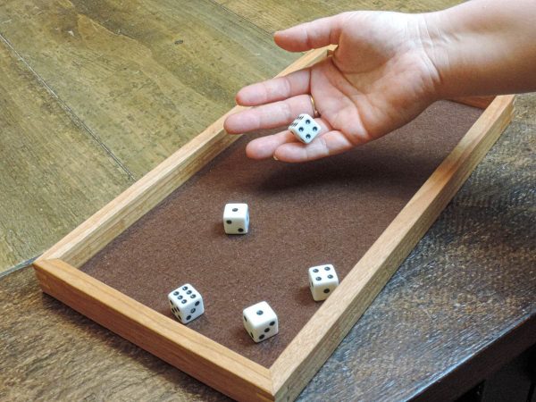 Wood dice tray with maple miter keys and felt inlay on a baltic birch bottom. Perfect for yahtzee, sorry, Parcheesi, Monopoly and Clue. Made in Canada by Bergeron Woodgrains