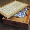 Elegant handcrafted wooden board game featuring a Gin Rummy scorecard with pegs and playing cards displayed inside a dovetail and boxed finger joints, storage box. Made by Bergeron Woodgrains