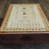 Handcrafted wooden board game featuring a Euchre scorecard with peg and playing card storage box showcasing dovetail and box finger joints. Made by Bergeron Woodgrains