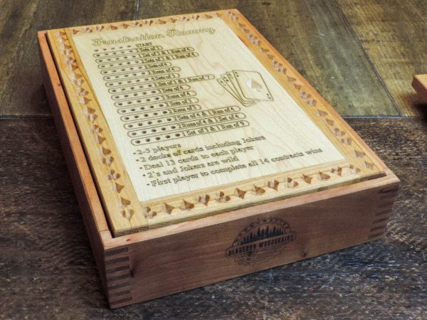 Handcrafted wooden board game featuring a Frustration Rummy and Gin Rummy double sided scorecard with storage box showcasing dovetail and box finger joints. Made by Bergeron Woodgrains