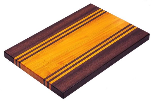 Purple heart and Osage Orange edge grain cutting board with purple heart and osage orange accent strips. Made in Canada by Bergeron Woodgrains