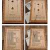 Handcrafted wooden board game featuring Euchre and Frustration Rummy scorecards displaying pegs and Bicycle playing cards in play. Made by Bergeron Woodgrains