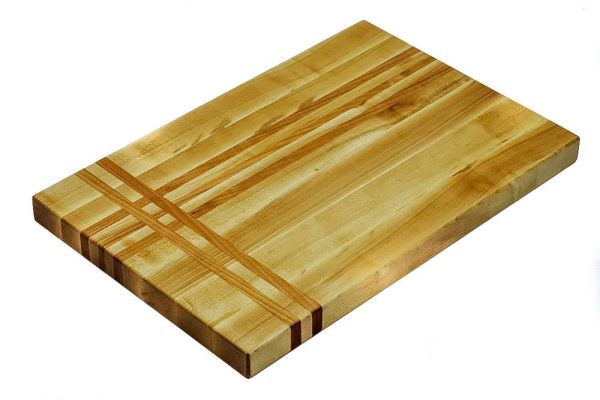 Maple edge grain cutting board with cherry stripes along the long and short edge. Canadian made by Bergeron Woodgrains