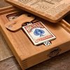 Handcrafted wooden board game featuring a Ludo scorecard with storage box with pegs and peg storage closure, Bicycle playing cards and dice displayed. Played similarly to Parcheesi. Made by Bergeron Woodgrains