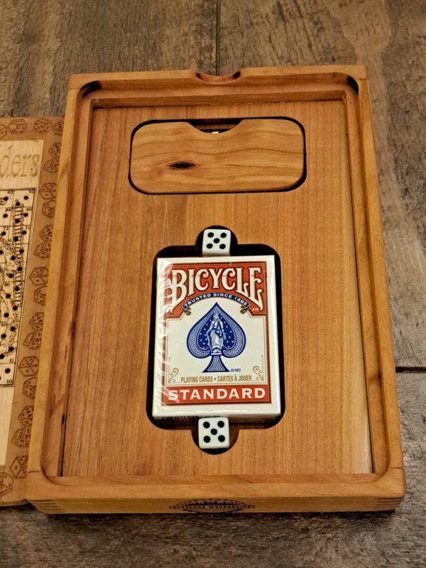 Handcrafted wooden board game featuring a Serpents and Ladders scorecard with storage box with peg storage and Bicycle playing cards displayed. Played similar to Snakes and Ladders. Made by Bergeron Woodgrains