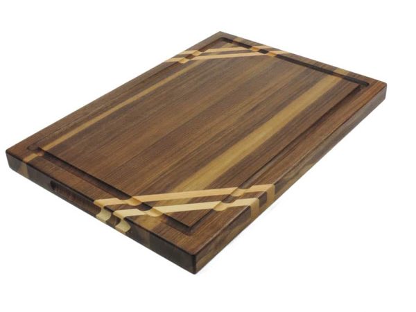 Walnut edge grain cutting board with two Maple accent strips along 2 opposing corners featuring a juice groove and handles. Made in Canada by Bergeron Woodgrains