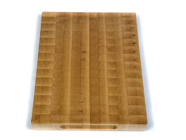 Handcrafted Maple end grain cutting board featuring handles on the side of the cutting board. Made in Canada by Bergeron Woodgrains.