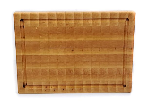 Handcrafted Maple end grain cutting board featuring Juice groove. Made in Canada by Bergeron Woodgrains.