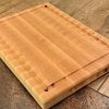 Handcrafted Maple end grain cutting board featuring juice groove and handles. Made in Canada by Bergeron Woodgrains.