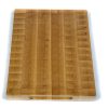 Handcrafted Maple end grain cutting board featuring handles on the side of the cutting board. Made in Canada by Bergeron Woodgrains.