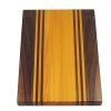 Walnut and Osage Orange edge grain cutting board with walnut and osage orange accent strips. Made in Canada by Bergeron Woodgrains