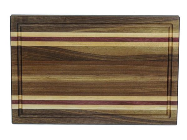 Walnut edge grain cutting board with maple and Purple Heart accent strips showcasing juice groove. Canadian made by Bergeron Woodgrains