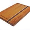 Cherry edge grain cutting board with maple and purple heart accent strips showcasing juice groove and handles. Made in Canada by Bergeron Woodgrains