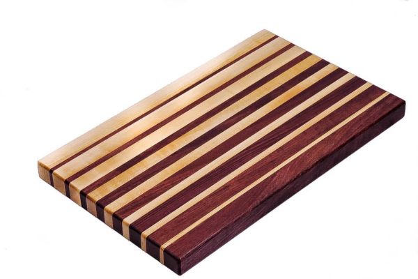 Maple and purple heart edge grain cutting board featuring narrowing opposing strips running along the long edge of the cutting board. Canadian made by Bergeron Woodgrains