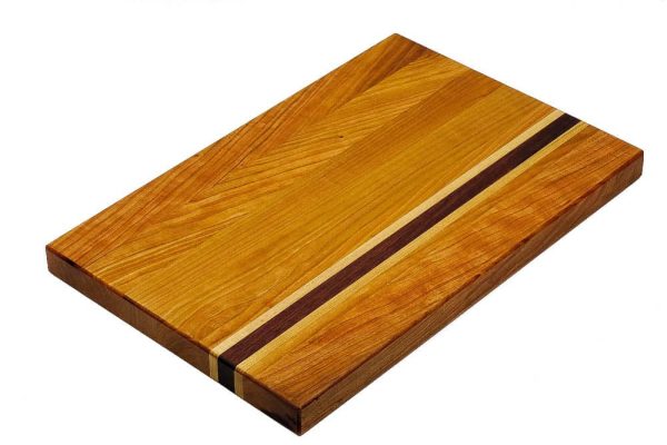 Cherry edge grain cutting board with maple and purple heart accent strips. Made in Canada by Bergeron Woodgrains