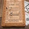 Handcrafted wooden board game featuring a Rummy 500 scorecard with storage box displaying Bicycle playing cards and metal pegs in play. Made by Bergeron Woodgrains