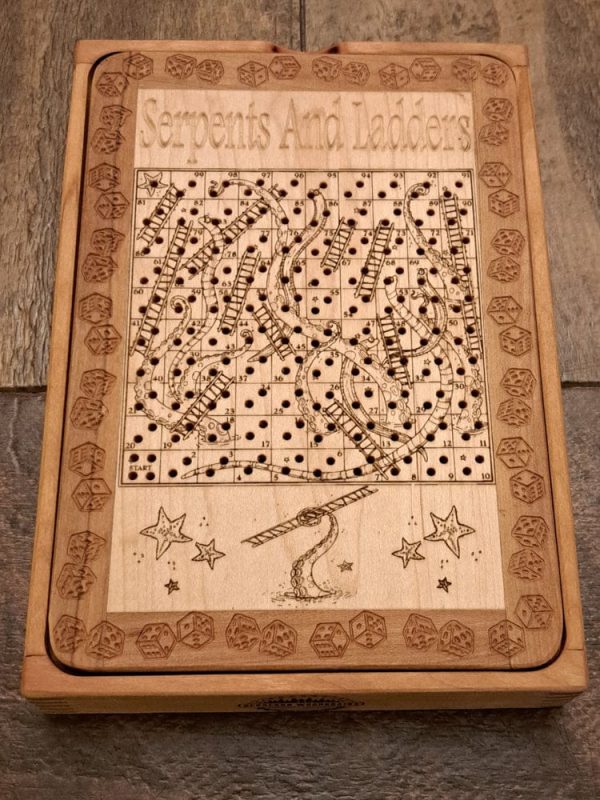 Handcrafted wooden board game featuring a Serpents and Ladders scorecard with storage box showcasing dovetail and box finger joints. Played similarly to Snakes and Ladders. Made by Bergeron Woodgrains