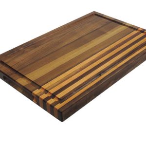 Walnut edge grain cutting board with 4 cherry stripes, featuring juice groove and handles along the top and side of the board. Canadian made by Bergeron Woodgrains