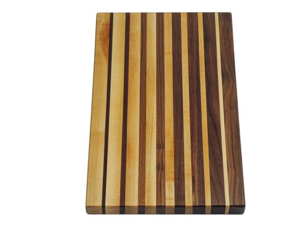 Maple and walnut edge grain cutting board featuring narrowing opposing strips running along the long edge of the cutting board. Canadian made by Bergeron Woodgrains