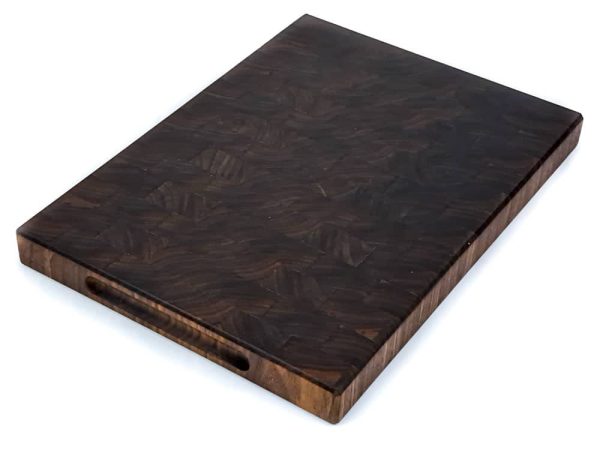 Handcrafted Walnut end grain cutting board featuring embedded grooved handles on he side of the cutting board. Made in Canada by Bergeron Woodgrains.