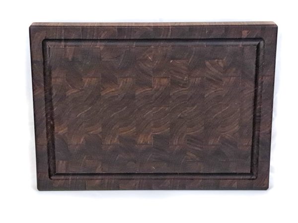 Handcrafted Walnut end grain cutting board featuring embedded grooved juice groove on he top of the cutting board. Made in Canada by Bergeron Woodgrains.