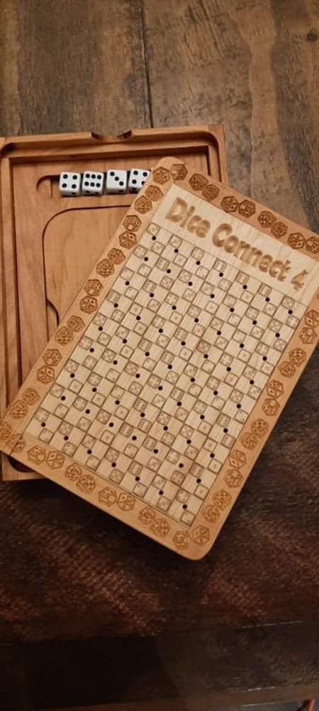 Handcrafted wooden board game featuring a Dice Connect 4 scorecard with storage box for accessories. Made by Bergeron Woodgrains.