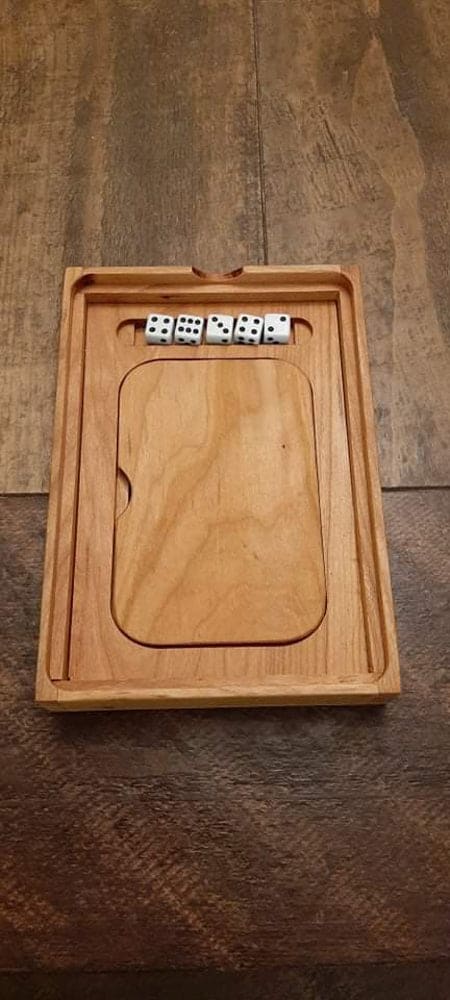 Yardzee game wood storage box with dice and magnetic enclosure for wooden pegs