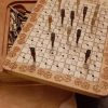 Handcrafted wooden board game featuring a Yardzee and Dice Connect 4 with storage box for accessories. Scorecards with pegs and dice displayed. Made by Bergeron Woodgrains.