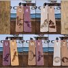 Collection of laser engraved wood bookmarks with various wildlife animals